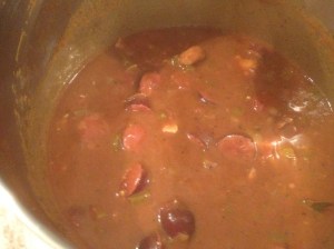 add in stock and sausage