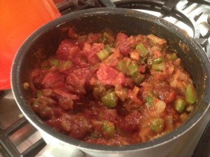 Mix in tomatoes and spices