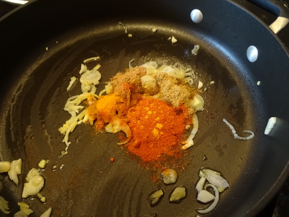 Adding Spices to Pan
