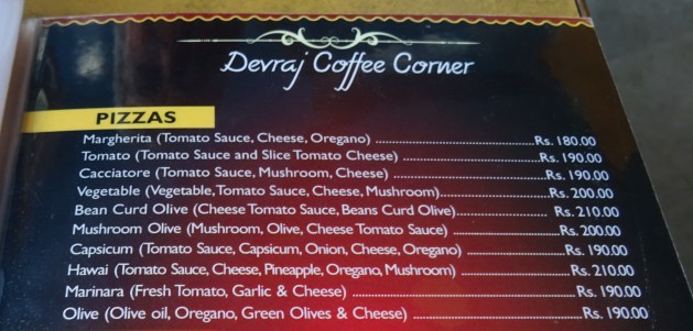 Pizza menu at Devraj Coffee House in Rishikesh