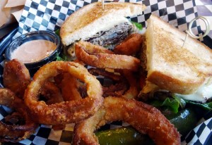 Brisket Melt with a side of Onion Rings